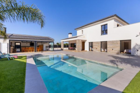 Palm Breeze Villa by Fidalsa